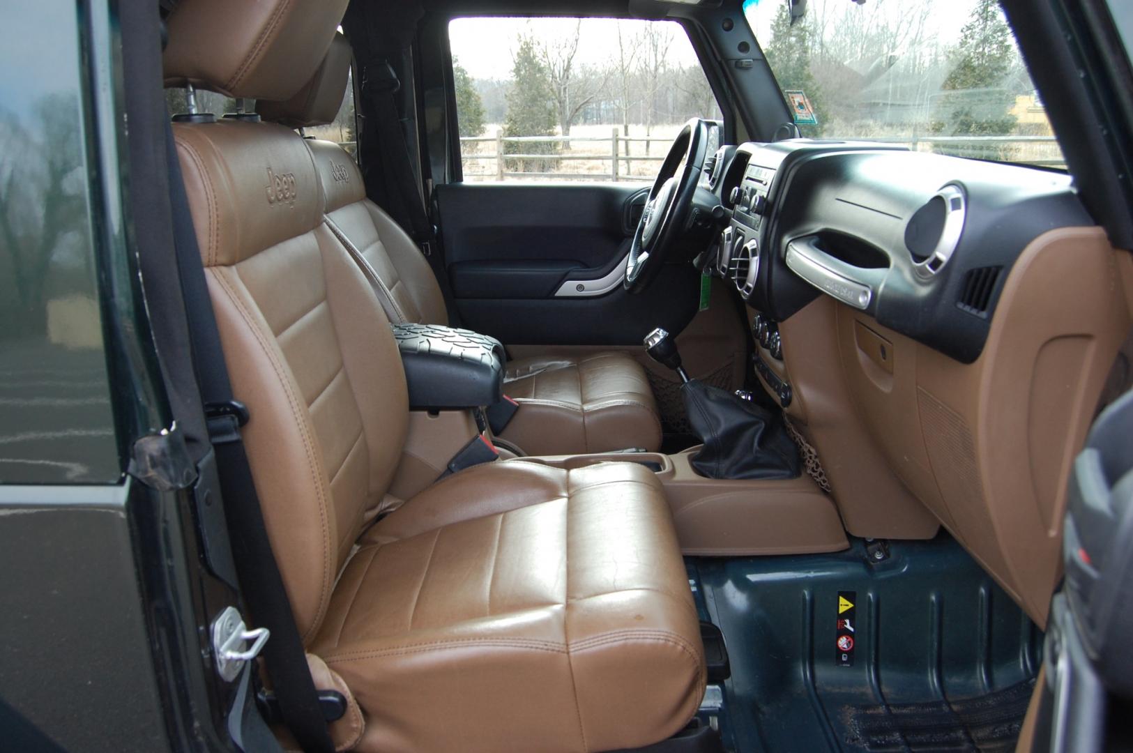 2011 Green /Tan leather Jeep Wrangler Sahara 4WD (1J4AA5D10BL) with an 3.8L V6 OHV 12V engine, 6 Speed Manual transmission, located at 6528 Lower York Road, New Hope, PA, 18938, (215) 862-9555, 40.358707, -74.977882 - Here we have a nice running and driving Jeep Wrangler with a 3.8L V6 putting power to a 4x4 manual transmission. Options include Tan leather, AC, heat, heated front seats, power windows/locks/mirrors, AM/FM/SAT/DISC/AUX radio, cruise control, tilt steering wheel, auto headlights, 3 piece removable h - Photo#12